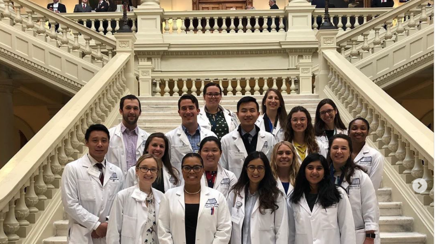 Dr. Tracey Henry and other Emory physicians and trainees at the GA State Capitol Building