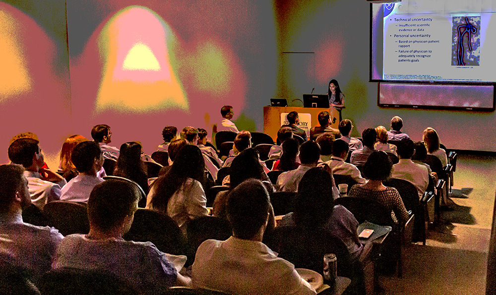 Posterized photo of an audience at a lecture